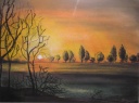 Sonnenuntergang über den Wiesen